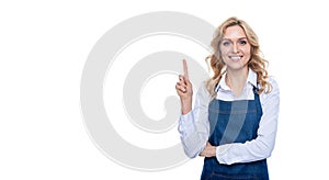 happy barista woman in apron point finger isolated on white background