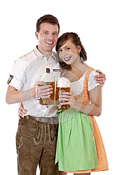 Happy Bavarian couple with Oktoberfest beer stein