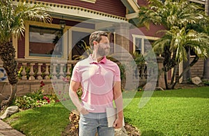 happy bearded man broker selling or renting house on pc online, property appraiser.