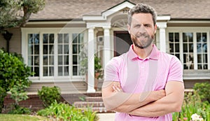 happy bearded man real estate agent selling or renting house, copy space, success