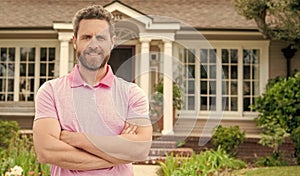 happy bearded man real estate agent selling or renting house, copy space, success