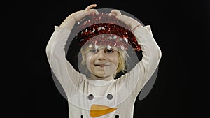 Happy beautiful baby girl in snowman costume. Christmas. Make faces, dance