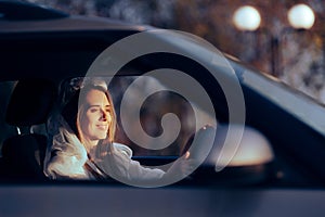 Happy Beautiful Bride Driving in Her Car for the Ceremony