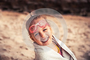 Happy beautiful child girl on beach smiling portrait summer vacation happy childhood lifestyle