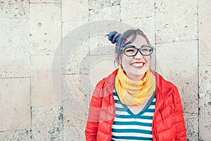 Happy beautiful fashion hipster woman with colorful hair laughing