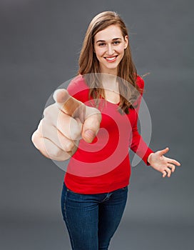 Happy beautiful girl for successful emphasis or cheerful accusation photo
