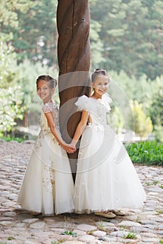 Happy beautiful girls with white wedding dresses