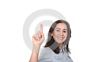 Happy beautiful Hispanic woman pointing with finger on blank copy space smiling confident isolated