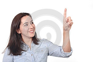 Happy beautiful Hispanic woman pointing with finger on blank copy space smiling confident isolated