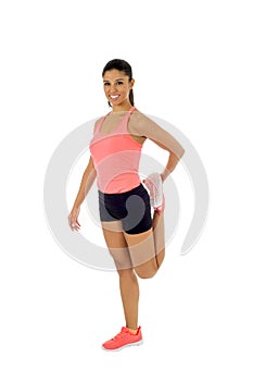 Happy beautiful latin woman stretching body muscles doing fitness workout