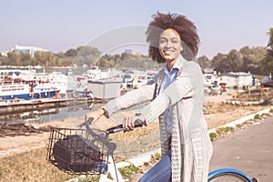 Happy And Beautiful Mixed Race Black Woman Ride Bicycle