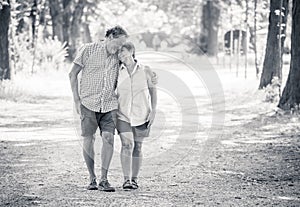 Happy senior couple walking and enjoying life outdoors