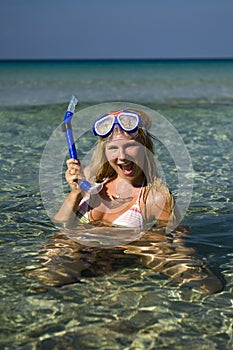 Happy beautiful summer diving woman