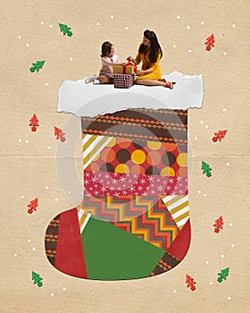 Happy beautiful woman, mother sitting with little girl, daughter on giant christmas sock. Festive mood. Contemporary art