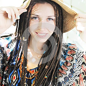 Happy beautiful woman portrait with dreadlocks hairstyle