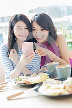 Happy bestie in restaurant