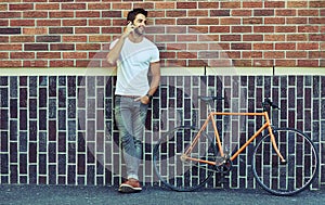 Happy, bicycle and man in city on phone call for mobile communication, urban and active lifestyle. Person, smartphone