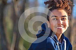 Happy Biracial Mixed Race African American Girl Teenager Smiling With Perfect Teeth
