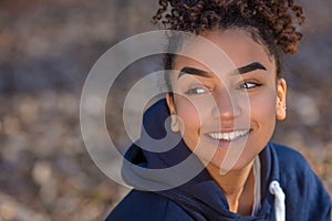 Happy Biracial Mixed Race African American Girl Teenager Smiling With Perfect Teeth