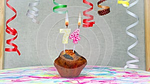 Happy birthday background with muffin with beautiful decorations with number candles 74. Colorful festive card happy birthday