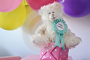 Happy birthday badge on a teddy bear