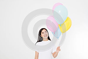 Happy birthday. Balloon party. Happy asian girl with balloons isolated on white background. Copy space. Blank template t shirt.