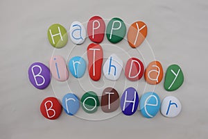 Happy Birthday Brother with colored stones over white sand