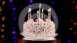 Happy Birthday cake with burning candles