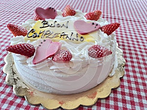 Happy Birthday Cake With Happy Birthday Lettering In Italian