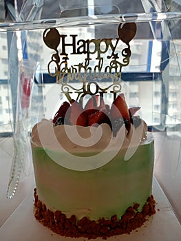 Happy birthday cake. Light green. Strawberry.