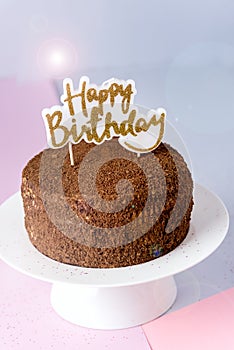 Happy Birthday Candles on Chocolate Cake Tasty Chocolate Homemade Cake for Holiday Muiticolored Background Vertical