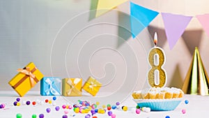 Happy birthday card from candles with the number 8, golden numbers from candles for congratulations on any holiday with beautiful