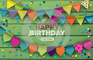 Happy Birthday card with colorful paper garlands and confetti