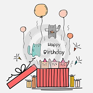 Happy Birthday Card With Cute Cat In The Big Gift Box. Angels Cat Holding A Cake And Cat Hanging Up In The Air With The Balloons.