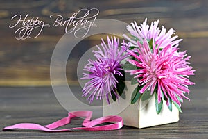 Happy Birthday card with flowers arranged in gift box