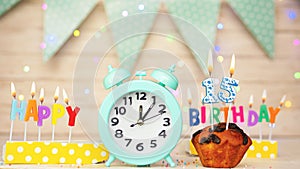 Happy birthday greeting card with muffin pie and retro clock on clock hands new birth. Beautiful background with decorations