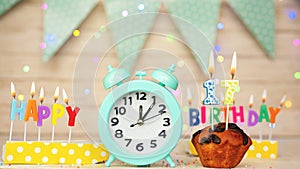 Happy birthday greeting card with muffin pie and retro clock on clock hands new birth. Beautiful background with decorations