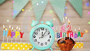 Happy birthday greeting card with muffin pie and retro clock on clock hands new birth. Beautiful background with decorations