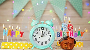 Happy birthday greeting card with muffin pie and retro clock on clock hands new birth. Beautiful background with decorations