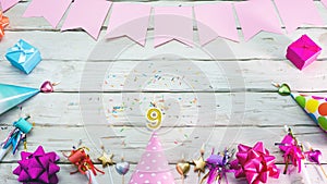 Happy birthday number 9. Copyspace. Beautiful card in pastel pink colors for a woman or a girl. Decorations festive place for you