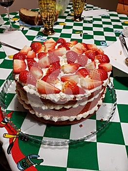 Happy birthday pie decorated with letter candles. Red velvet cake