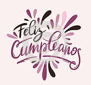 Happy birthday in Spain. Lettering in Spanish with splashes and curls. Vector illustration