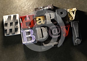 Happy Birthday title in vintage wood block text and hashtag