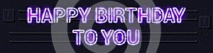 HAPPY BIRTHDAY TO YOU glowing purple neon lamp sign on a black electric wall