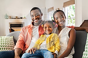 Happy black family with one child