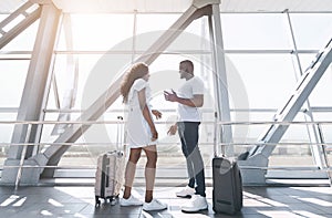 Happy Black Man And Woman Meeting In International Airport After Separation