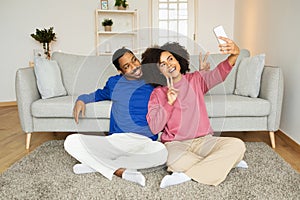 Happy Black Spouses Making Selfie On Smartphone Posing At Home