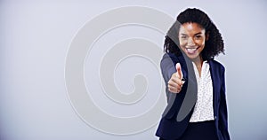 Happy black woman, arms crossed and thumbs up for business vote, corporate trust or service review. Mockup studio space