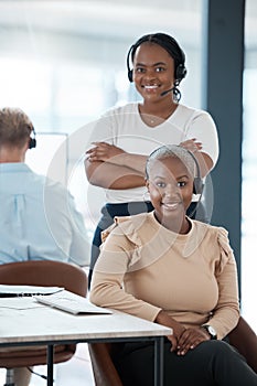 Happy, black woman and call center team smile in contact us, customer service or telemarketing at the office. Portrait