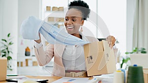 Happy black woman, fashion designer and box with material in small business, logistics or supply chain at boutique store